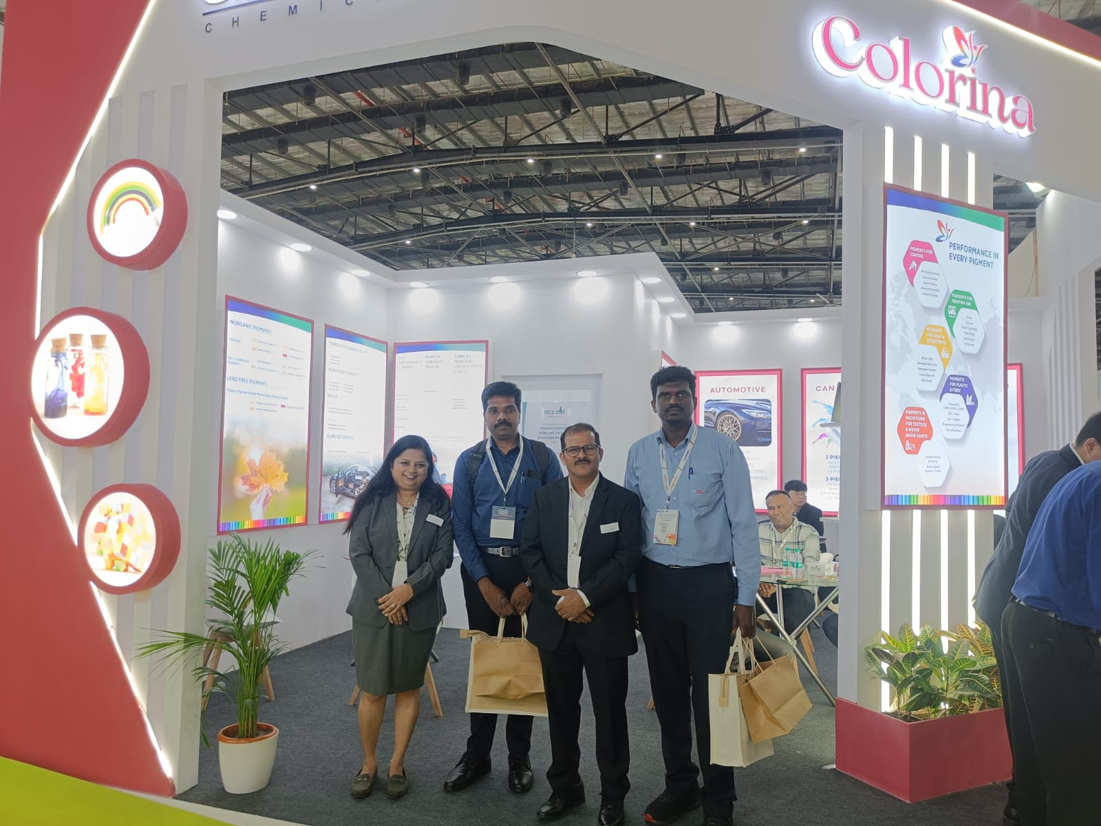 Clients and partners visiting Colorina's pigment solutions exhibition booth.