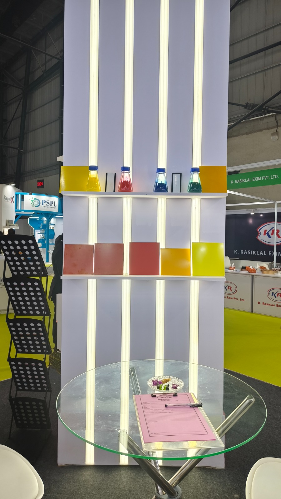Colorina chemical sample bottles and color swatch shade displays at trade expo.