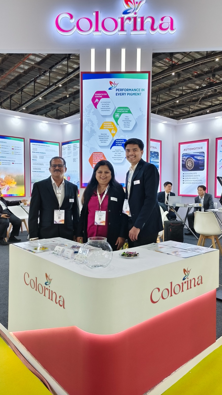 Colorina front reception desk and representatives at the international chemical exhibition.